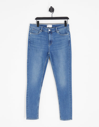 ASOS DESIGN spray on jeans with power stretch in light wash tint