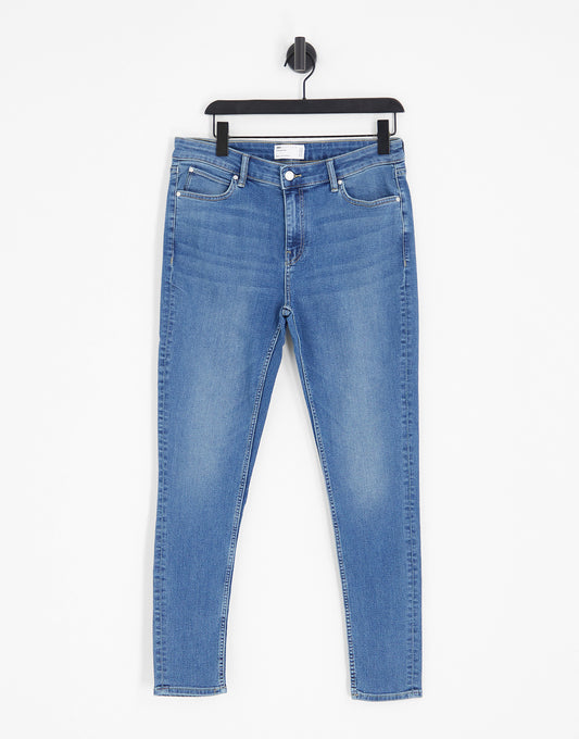 ASOS DESIGN spray on jeans with power stretch in light wash tint