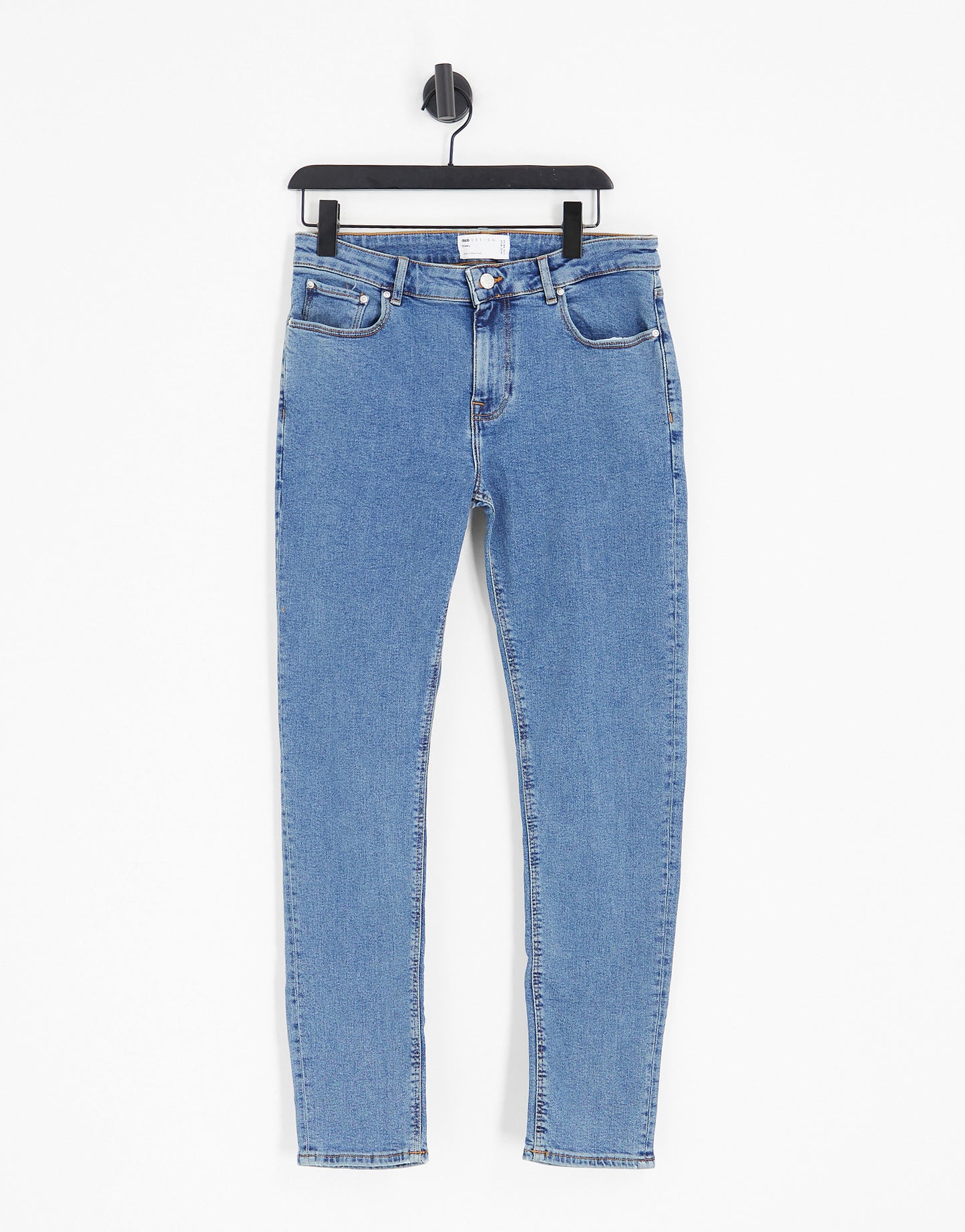 ASOS DESIGN skinny jeans in flat mid wash blue