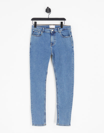 ASOS DESIGN skinny jeans in flat mid wash blue