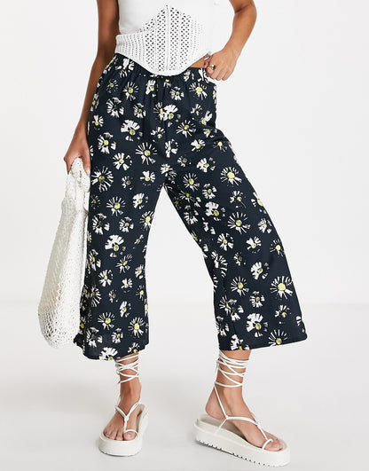 ASOS MADE IN KENYA daisy print pull on trousers in black