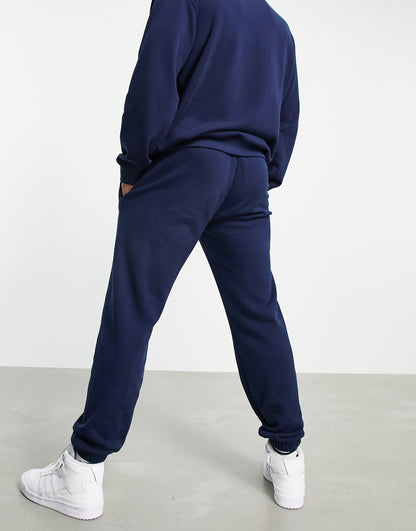 adidas Originals 'Retro Revival' logo graphics joggers in navy