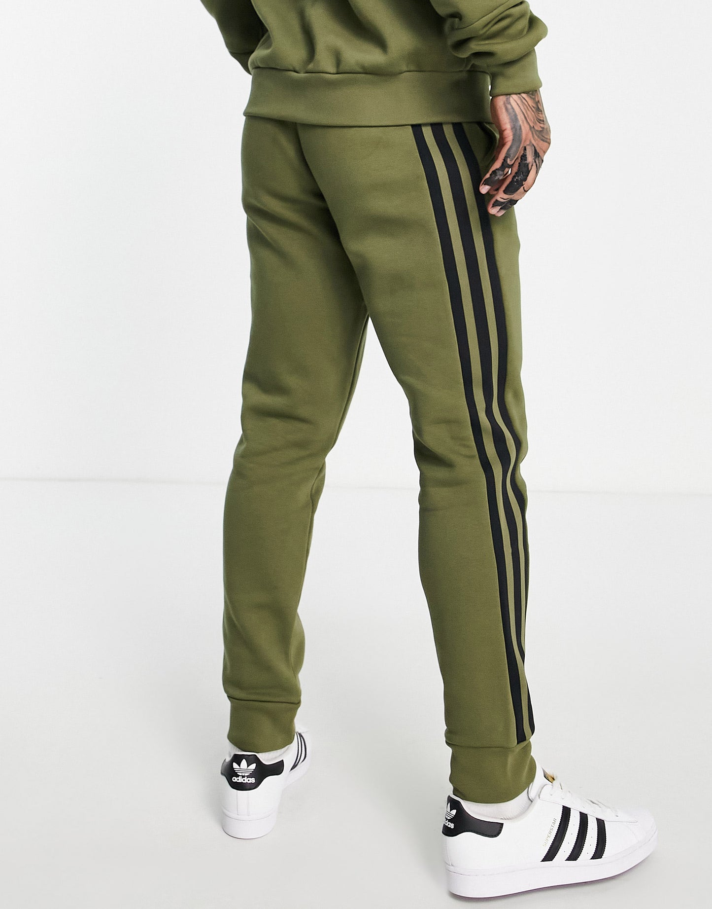 adidas joggers with three stripes in khaki