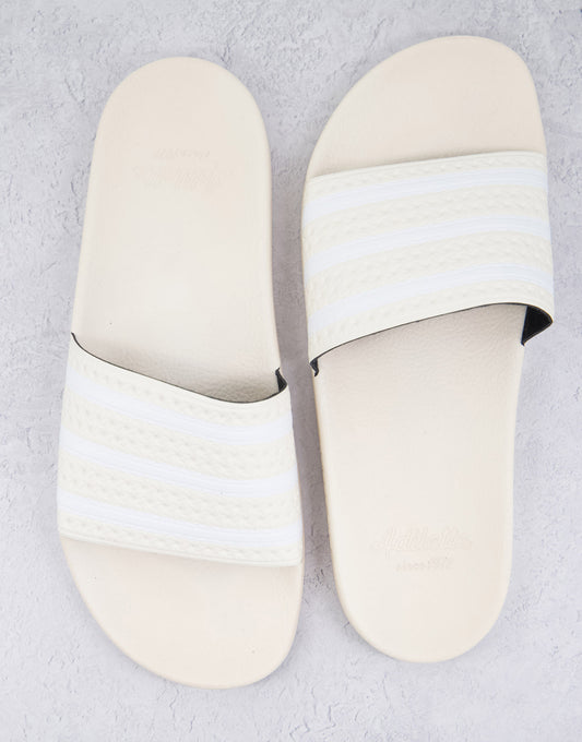 adidas Originals Adilette sliders in wonder white