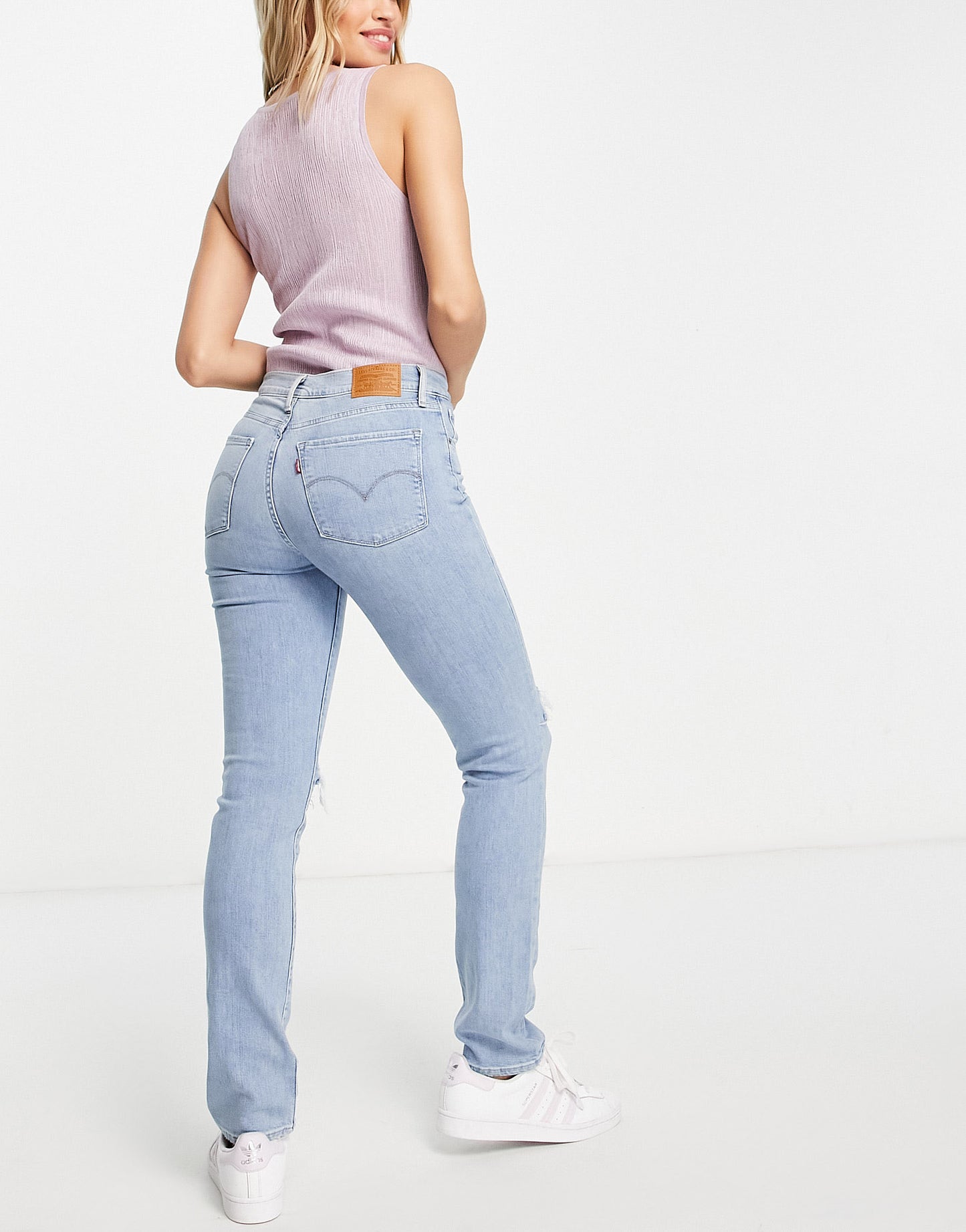 Levi's 724 high rise ripped straight jean in light wash