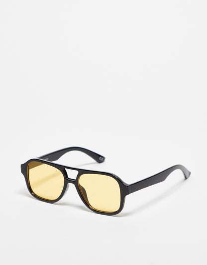 ASOS DESIGN 70's Aviator sunglasses with yellow lens in black