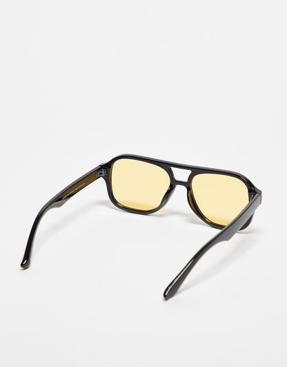 ASOS DESIGN 70's Aviator sunglasses with yellow lens in black