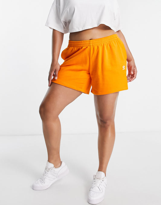 adidas Originals Plus essentials shorts with logo in orange