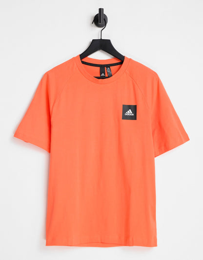 adidas Must Haves Stanford t-shirt in orange