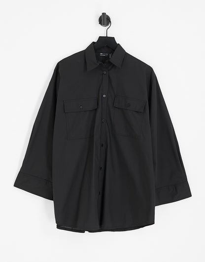 ASOS DESIGN oversized shirt with wide cuff detail in black