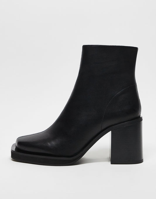 ASOS DESIGN heeled chelsea boots with angled toe in black leather