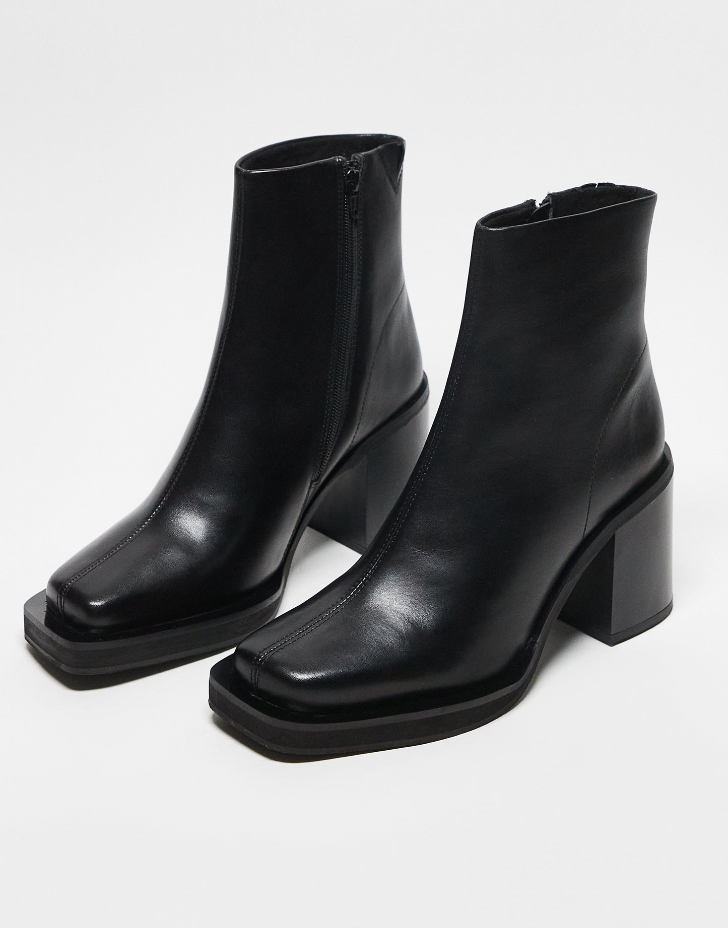 ASOS DESIGN heeled chelsea boots with angled toe in black leather