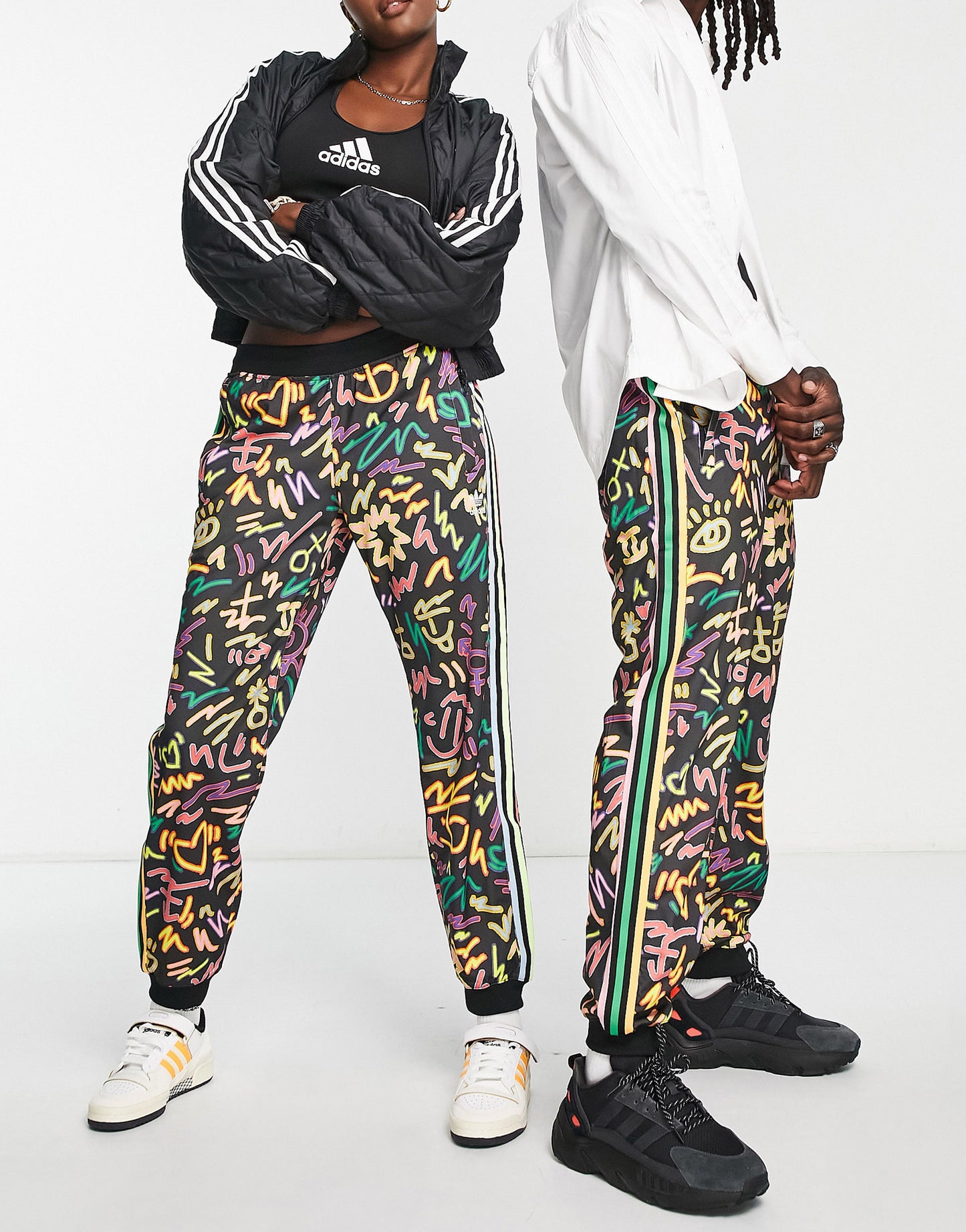 adidas Originals Pride printed track pants in black with Love Unites print