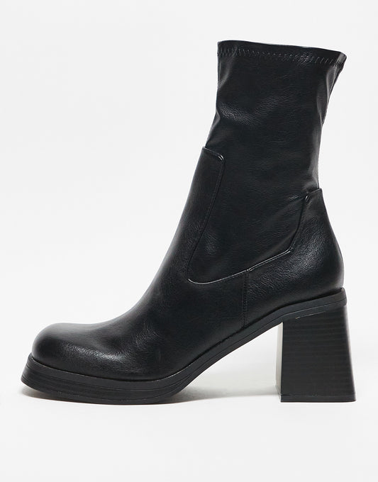 ASOS DESIGN Reversed mid-heel sock boots in black