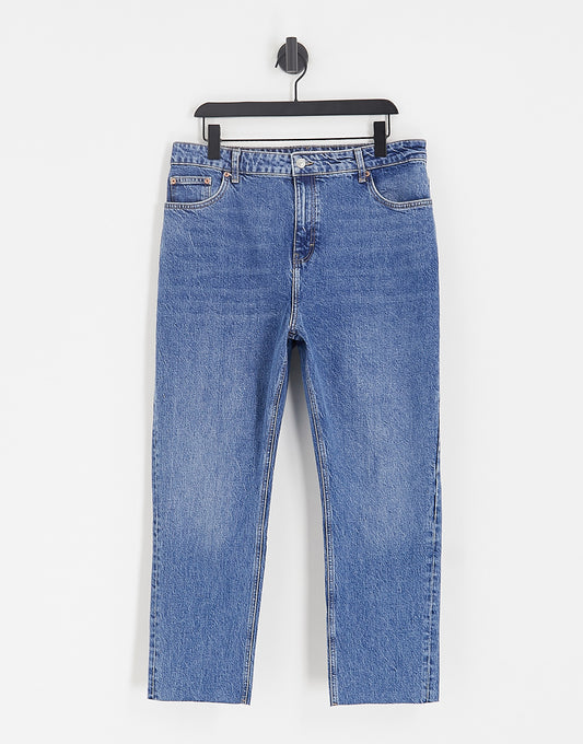 Topshop Curve cropped mid rise straight jeans with raw hems in mid blue