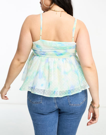 ASOS DESIGN Curve babydoll dobby cami with waterfall side detail in blurred floral