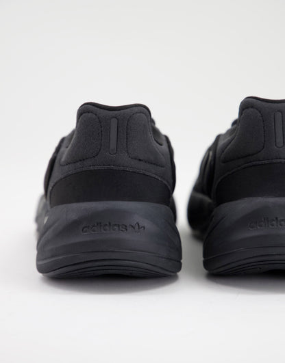 adidas Originals Ozelia trainers in triple black