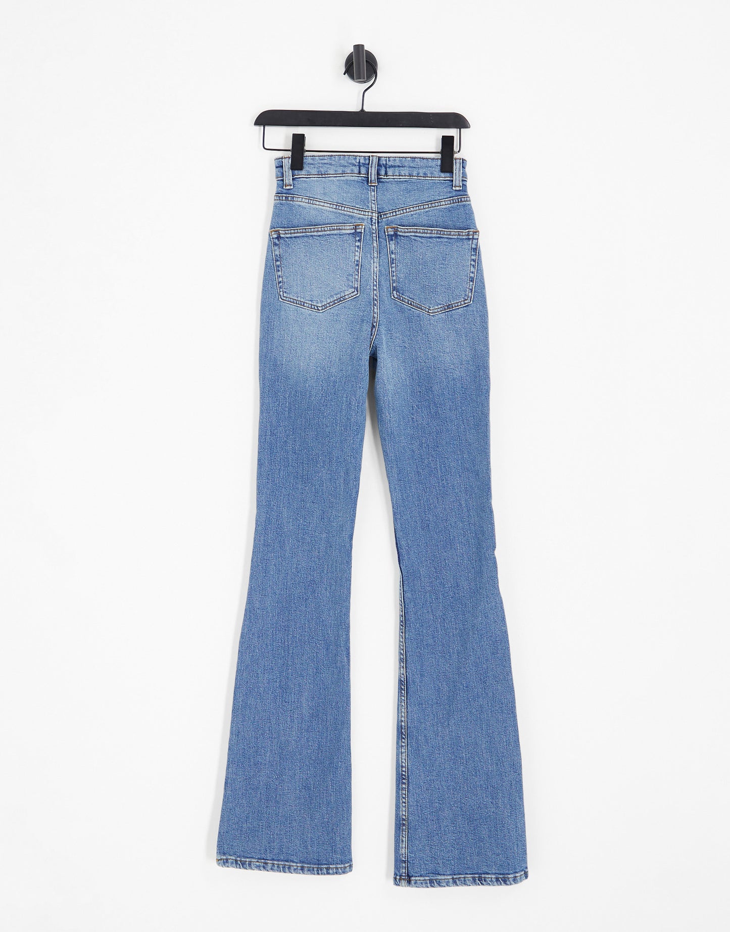 ASOS DESIGN Tall mid rise flare jeans in mid blue