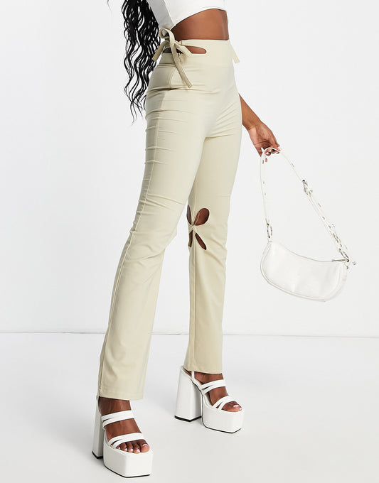 Zemeta high waisted cut out flared trousers in cream with tie waist