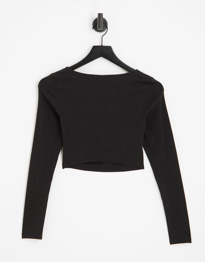 ASOS DESIGN twist detail long sleeve crop top in black