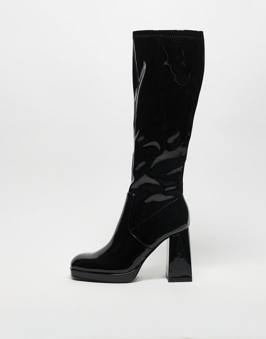 Heartbreak sock boots with block heel in black patent