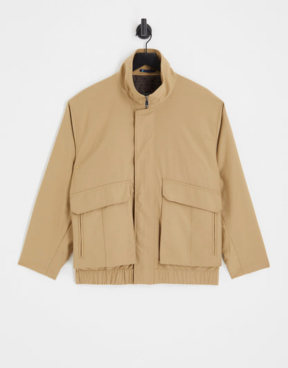 Harry Brown funnel neck oversized jacket in beige