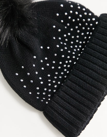 ASOS DESIGN beanie with diamante detailing and faux fur pom in black