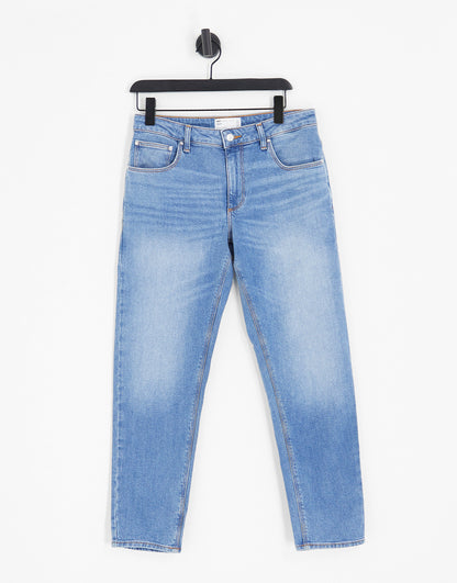 ASOS DESIGN stretch tapered jeans in 90s mid wash