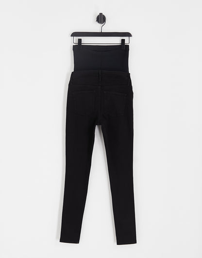 ASOS DESIGN Maternity skinny jeans in black with over bump waistband