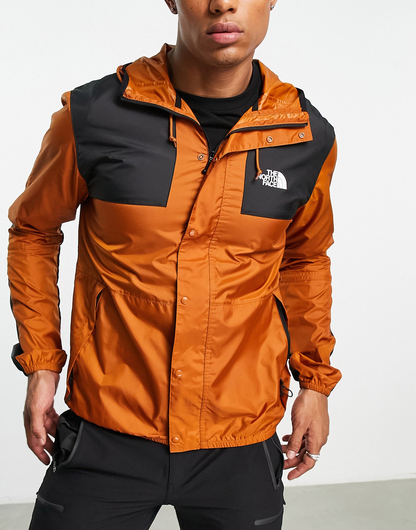 The North Face Seasonal Mountain water repellent jacket in brown and black - Exclusive at ASOS