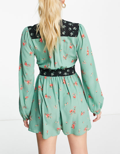 ASOS DESIGN Tall bubble crepe plunge neck playsuit with puff sleeve in mixed print