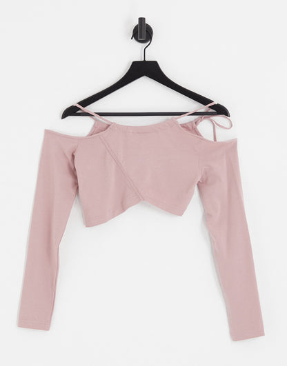 Weekday Zenia cut out long sleeve crop top in pale pink