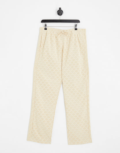 adidas Originas Trefoil monogram trackpants in neutral