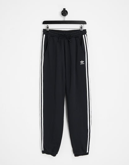 adidas Originals adicolor three stripe cuffed joggers in black