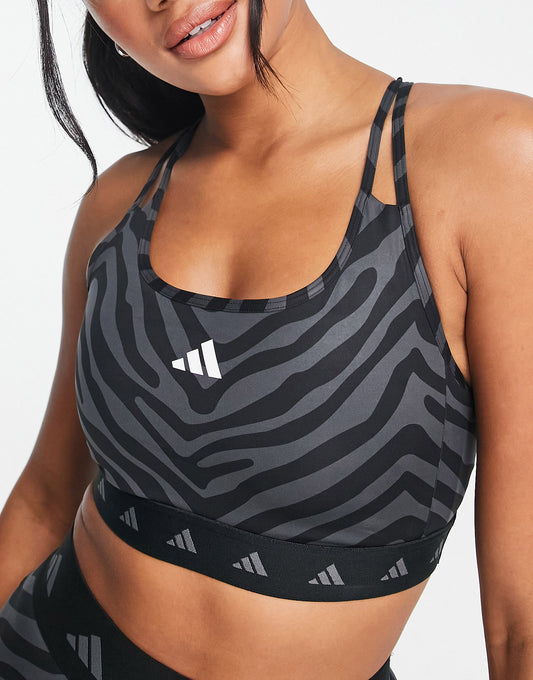 adidas Training Hyperglam lepoard print mid-support sports bra in black