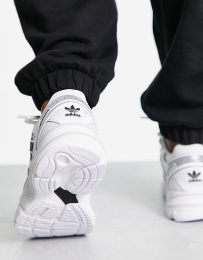 adidas Originals Astir SN trainers in white and black