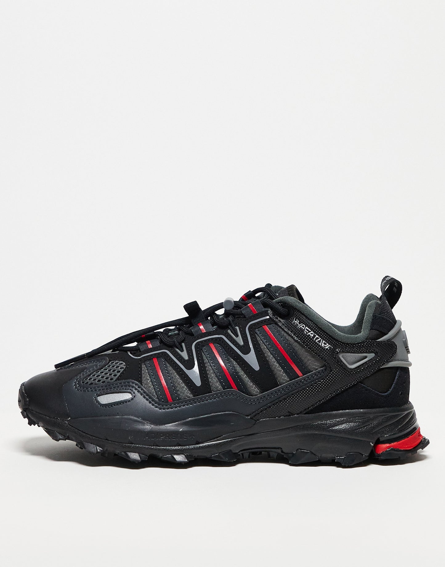 adidas Originals Hyperturf trainers in black and red