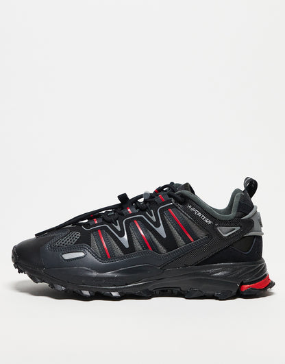 adidas Originals Hyperturf trainers in black and red