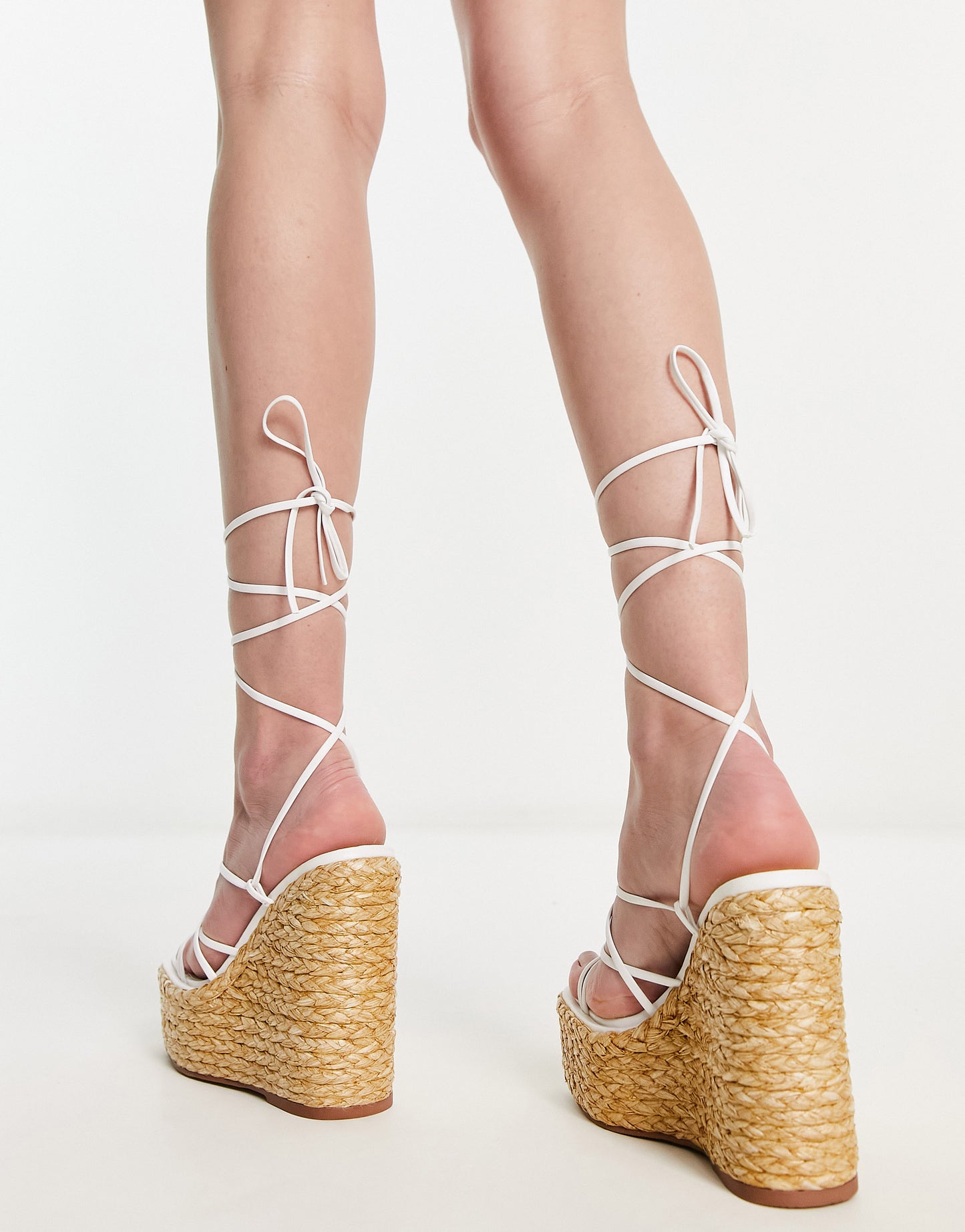 ASOS DESIGN Tanon tie leg wedges in white