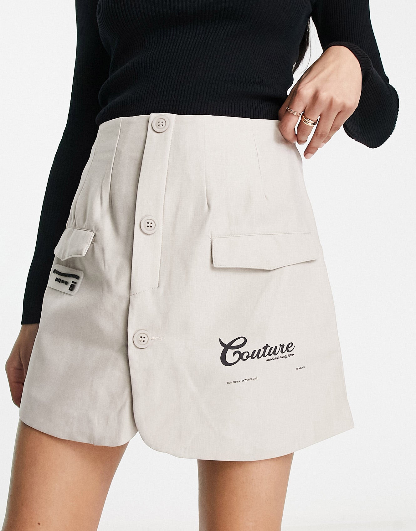 The Couture Club mini skirt co-ord with zip pockets in beige