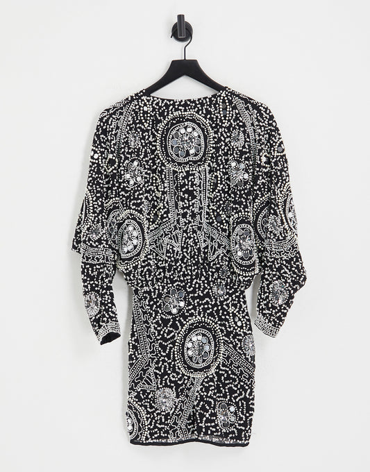 ASOS DESIGN embellished abstract batwing sleeve mini dress in black and white beading