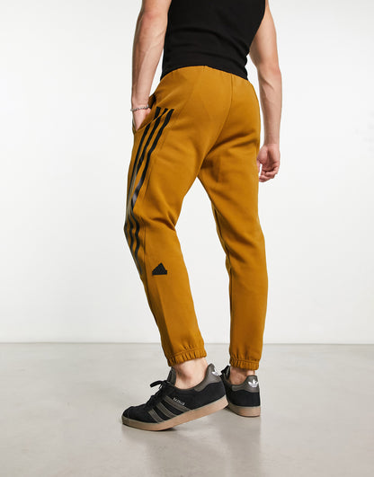 adidas Sportswear Future Icons 3 stripes joggers in dark orange