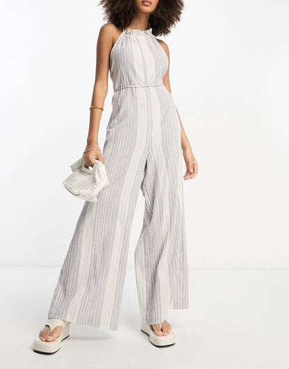 ASOS DESIGN crinkle frill halterneck jumpsuit with wide leg in stripe