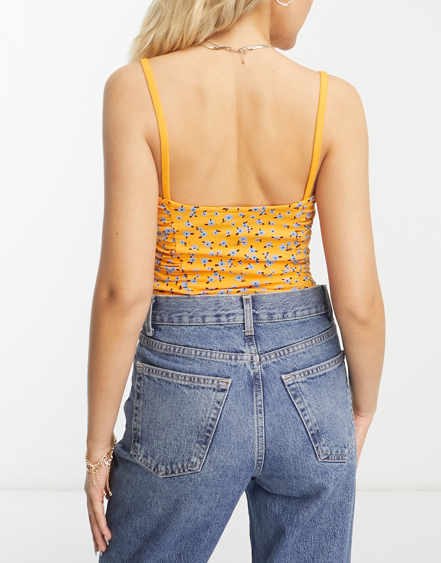 ASOS DESIGN cami top with ruched panels in orange floral ditsy print