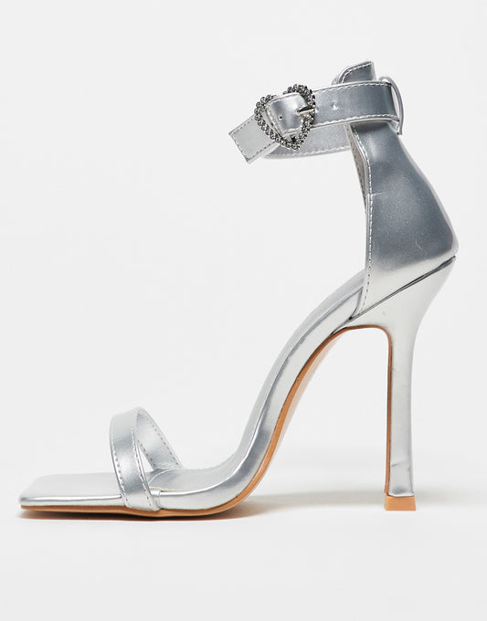 Public Desire Exclusive Elora heeled sandals with heart buckle in silver