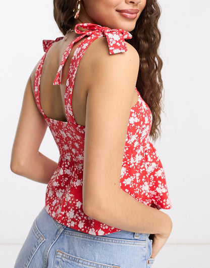 ASOS DESIGN Petite tie strap sun top with pephem in red based ditsy floral print