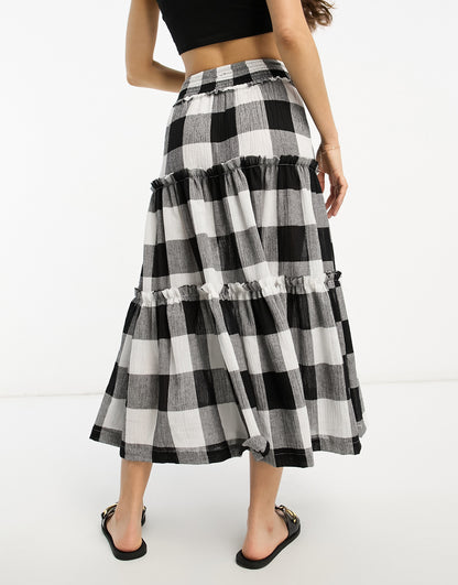 ASOS DESIGN Petite tiered midi skirt in mono gingham