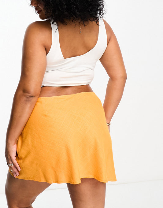 ASOS DESIGN Curve linen mini slip skirt in orange