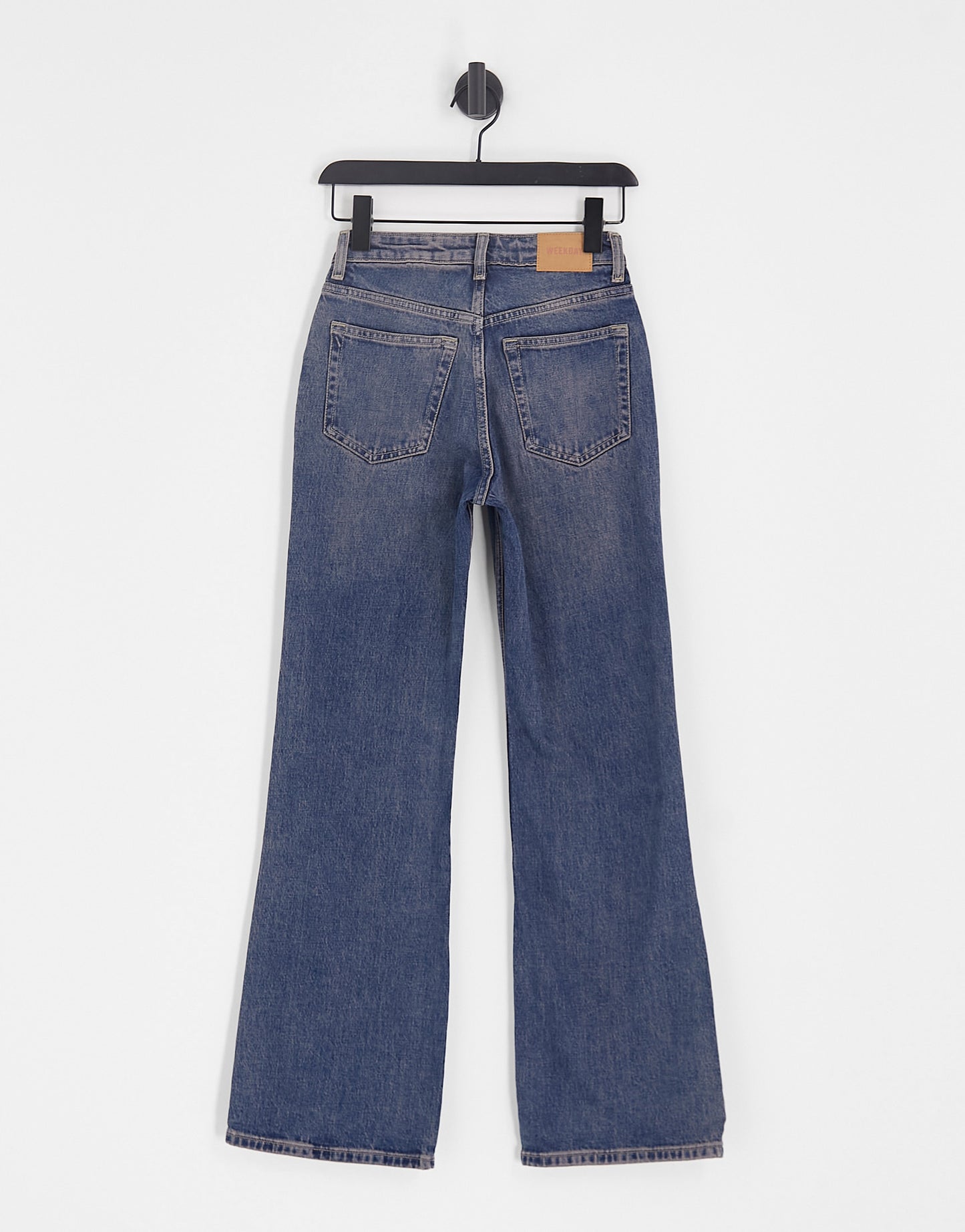 Weekday Glow high waist flared jeans in red cast blue wash