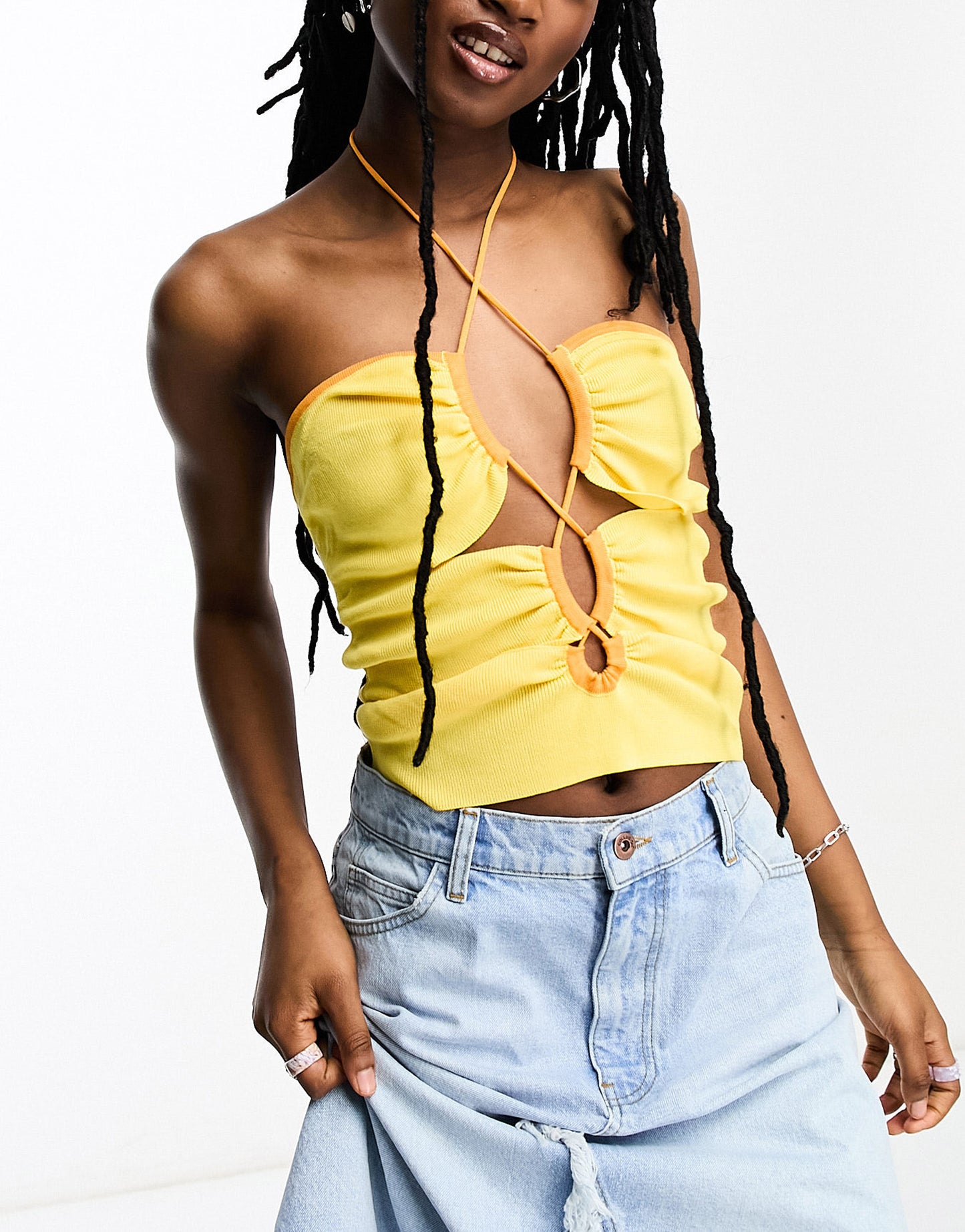 ASOS DESIGN knitted halter top with cut out detail and contrast trim in yellow